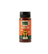 Bottle of Sweet Sting Space Jam mustard on a white background